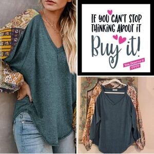 Beyove Stylish Teal Blouse with Patterned Sleeves. NWOT Size Medium
